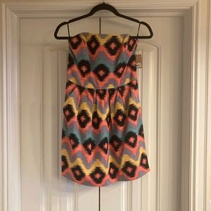 Rachel strapless dress, with pockets, colorful pattern and cute back detail